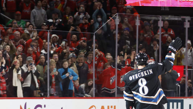 Dec 23, 2022; Washington, District of Columbia, USA; Washington Capitals left wing Alex Ovechkin (8) salutes the fans after the Capitals' game against the Winnipeg Jets. Ovechkin scored an empty-net goal against the Winnipeg Jets in the third period at Capital One Arena, his 802nd career goal, moving him into second place all-time in career NHL goals, passing the late Gordie Howe.